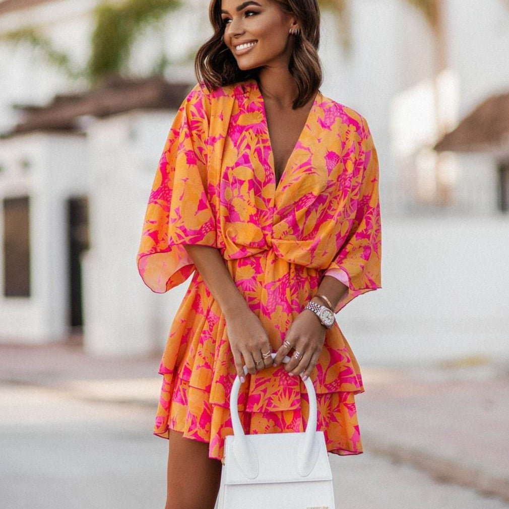 Minivestido bohemio con volantes y estampado floral